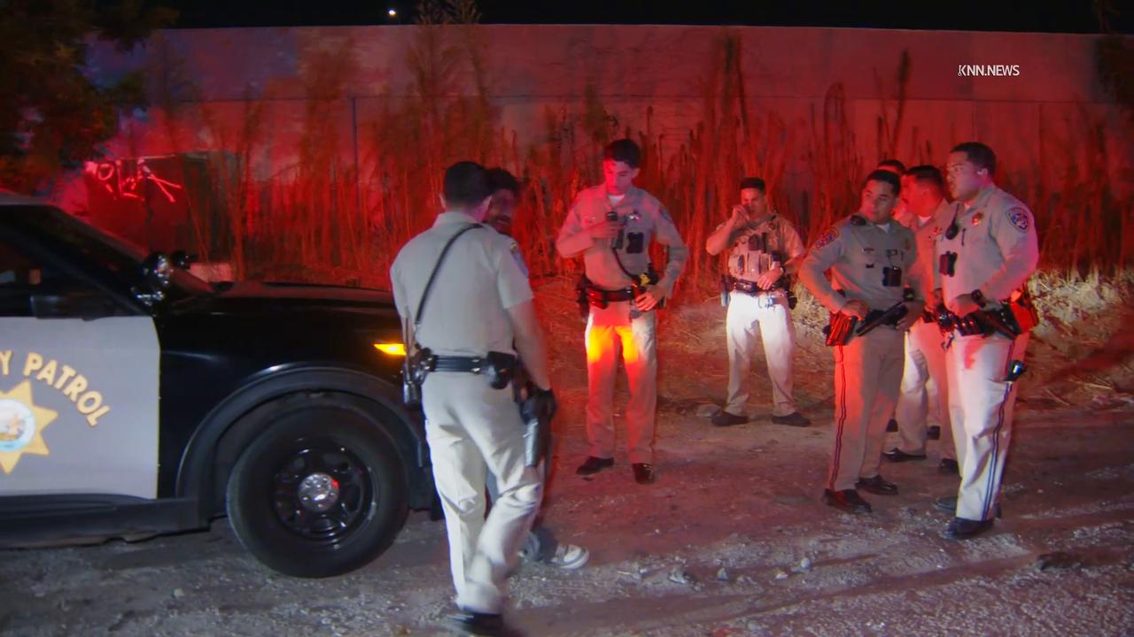 Video thumbnail for US, Los Angeles: El Monte Suspect Jumps 30 Feet Down into San Gabriel River at End Of Pursuit.
