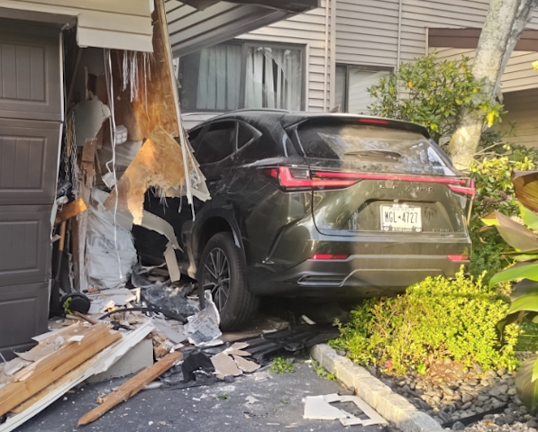 Video thumbnail for Woman arrested for DWI after crashing into Melville home