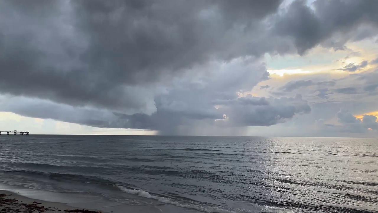 Video thumbnail for US: Storm Clouds and Rainfall Over The Sea in Dania Beach.