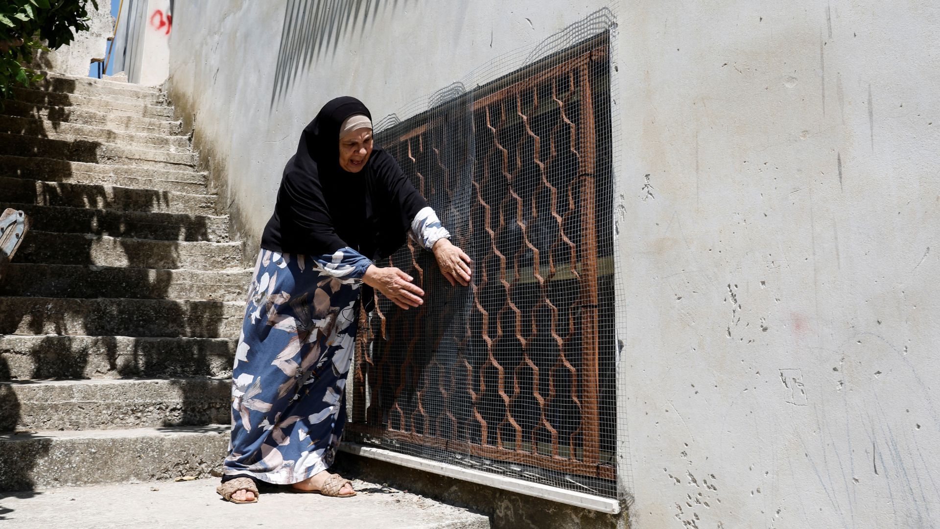 'Video thumbnail for Palestinians in the West Bank cage homes to guard against Israeli settler attacks'