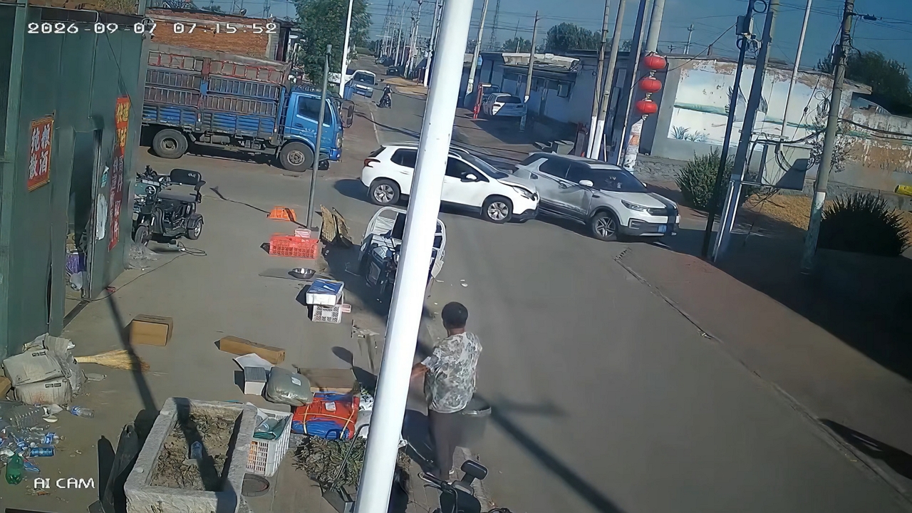 Video thumbnail for Two White SUVs Collide at Intersection in Hebei, China
