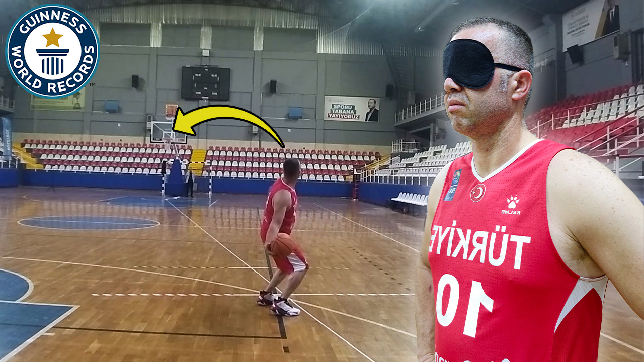 'Video thumbnail for Farthest blindfolded basketball hook shot'