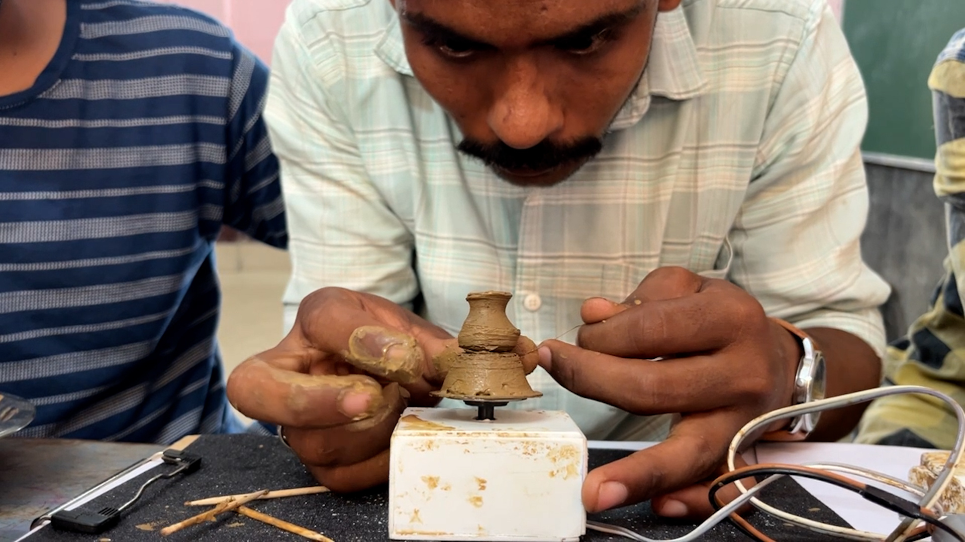 Video thumbnail for Smallest motorized pottery wheel  67 mm long, 50 mm wide and 47 mm high built by Sai Tirumalaneedi