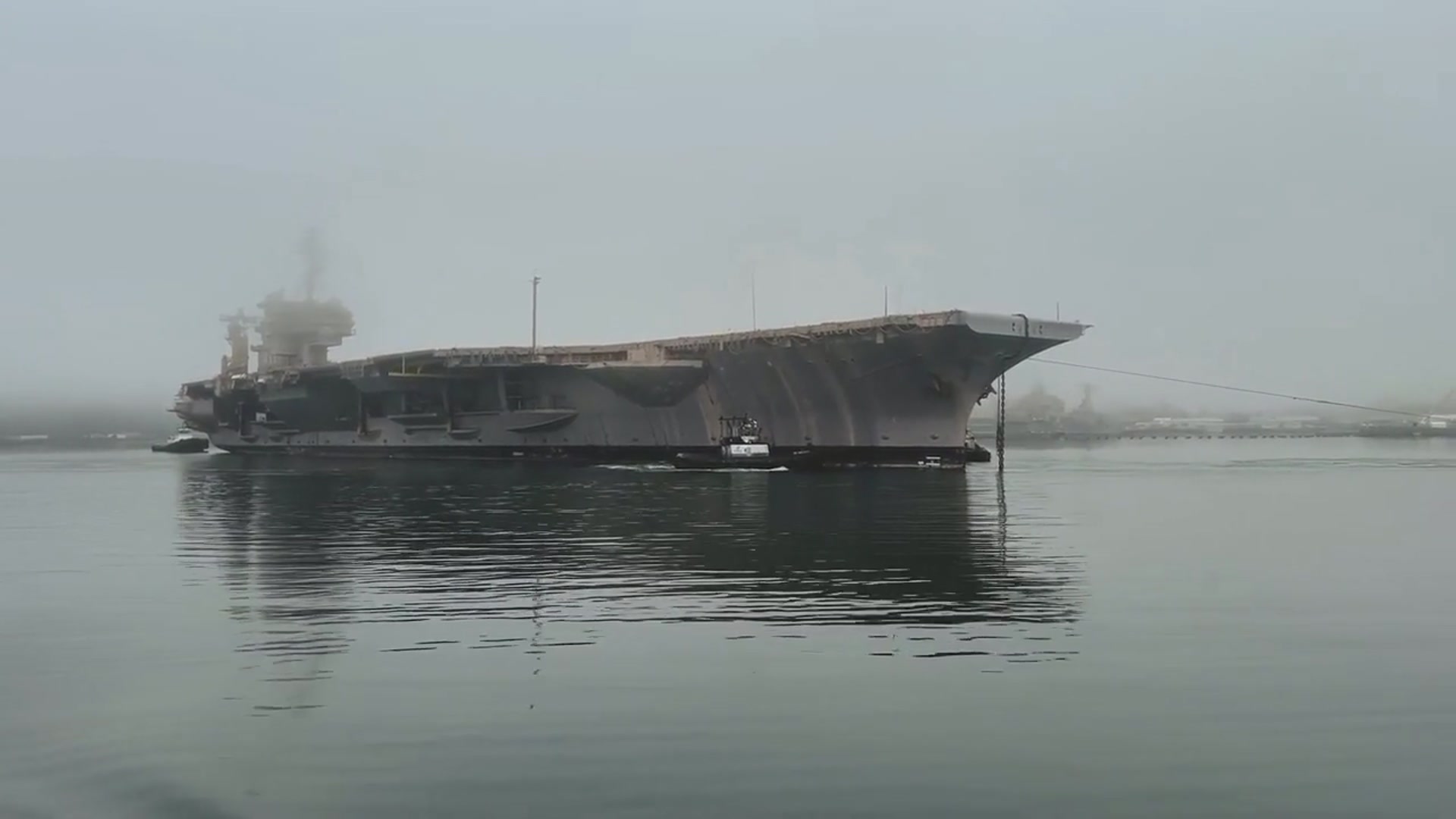 'Video thumbnail for USS Kitty Hawk Gets Tugged To The Graveyard'