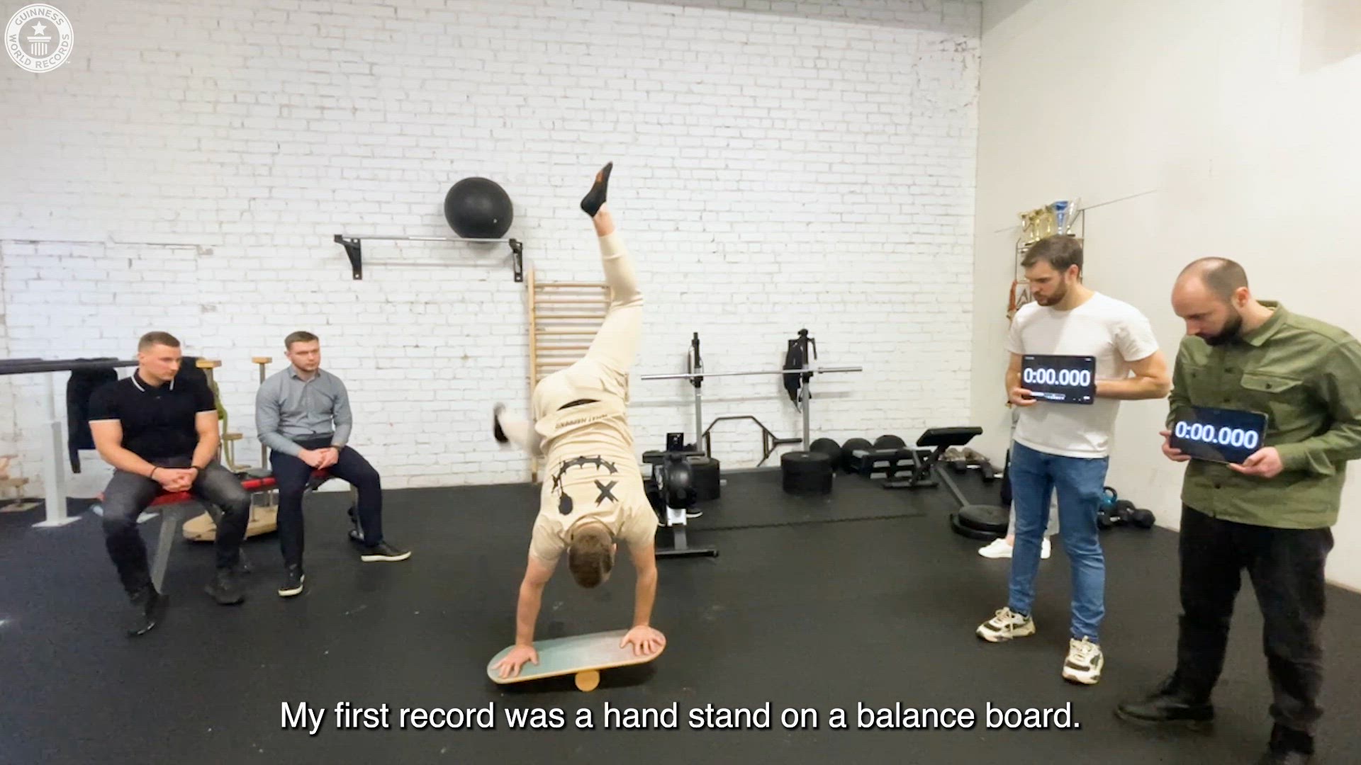'Video thumbnail for Three epic handstand world records set by Marius'