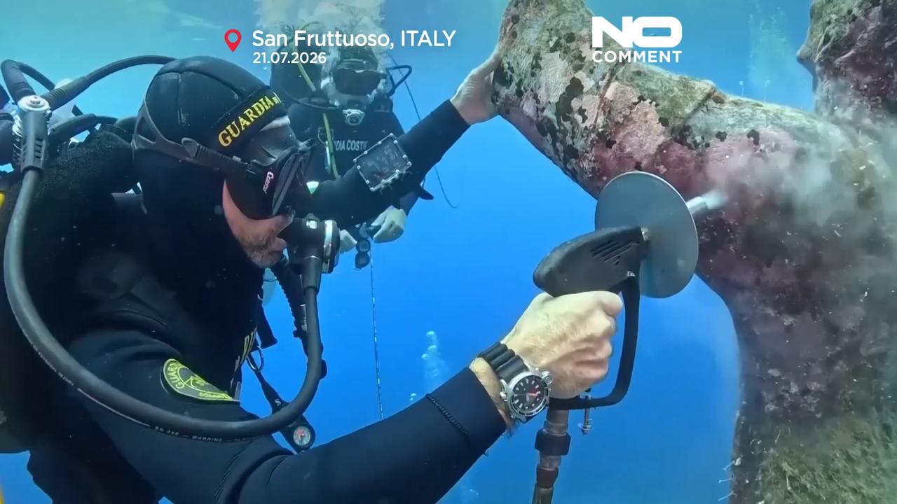 Video thumbnail for Divers restore Italy's Christ of the Abyss monument