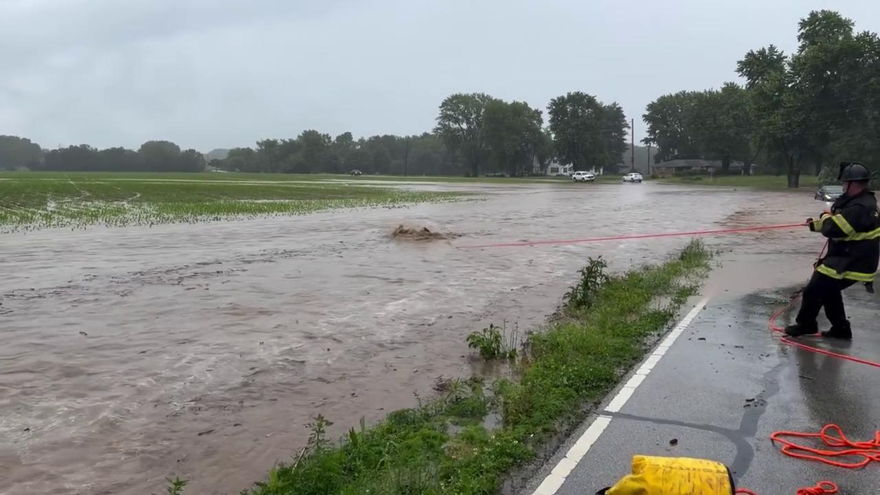 Video thumbnail for US: Firefighter Rescues Baby Deer From Raging Floodwaters After Water Emergency.