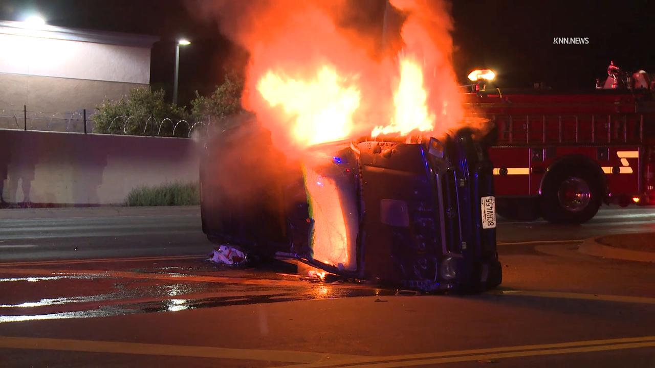Video thumbnail for US, Los Angeles: Pomona SUV Overturned with Fire.