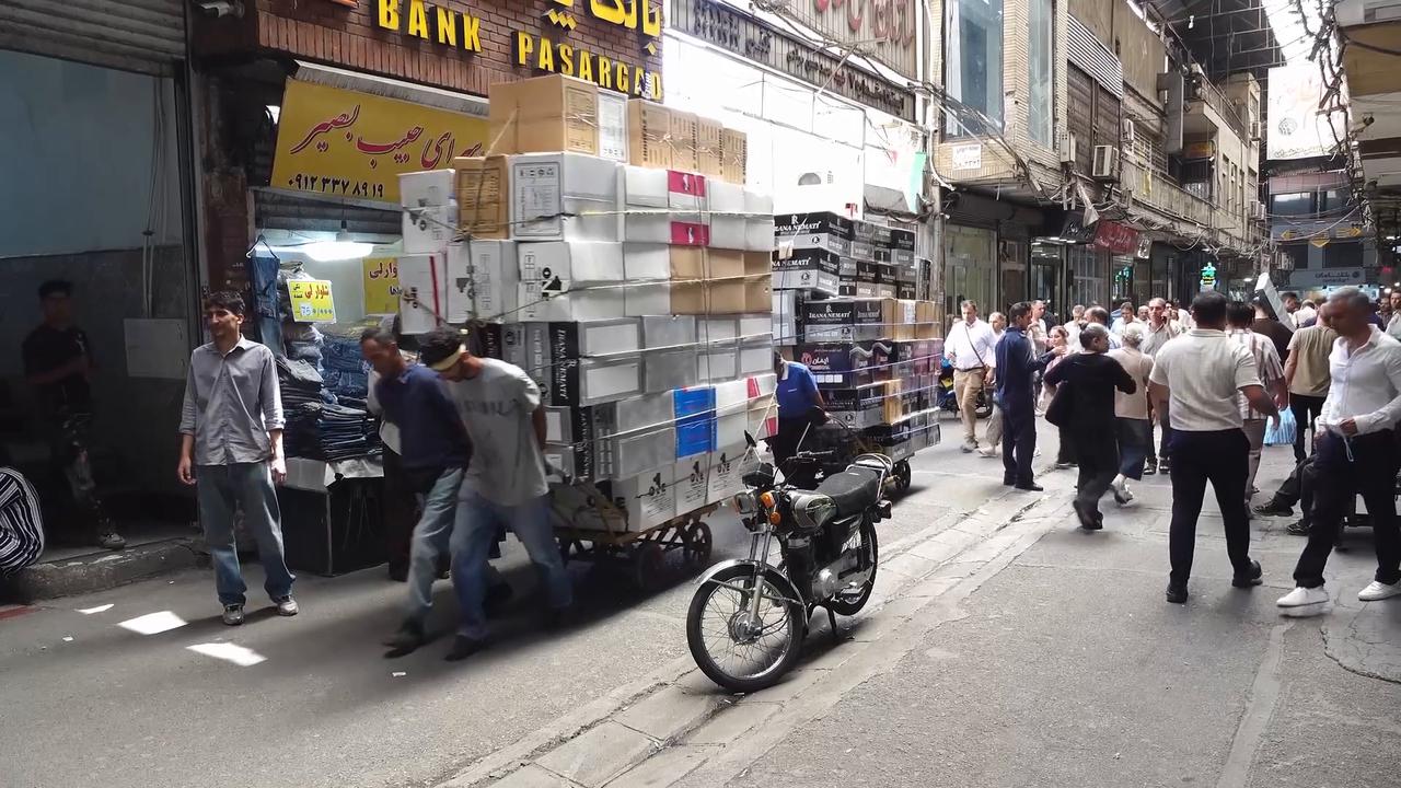 Video thumbnail for Iran: Daily life carries on in Tehran amid continuing Iran-US tensions.