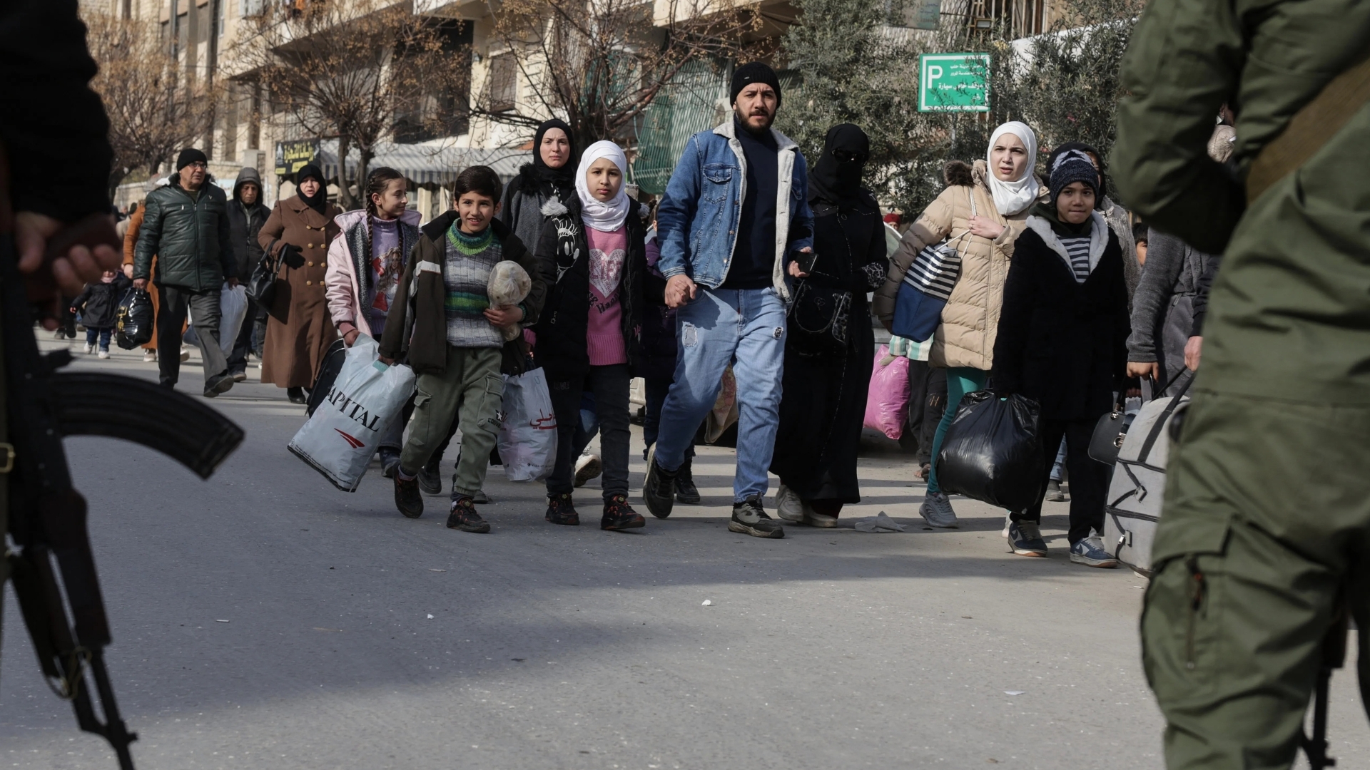 Video thumbnail for Civilians flee fighting in Aleppo: Violence between govt troops and Kurdish-led fighters