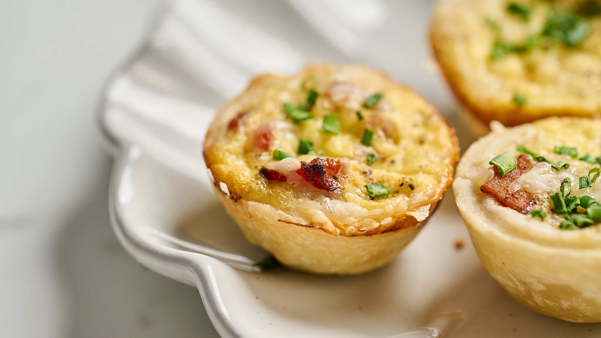 Video thumbnail for Mini Bacon And Gruyère Quiche Cups Recipe