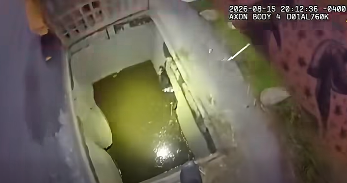 Video thumbnail for Body camera video captures rescue of dog trapped in storm drain
