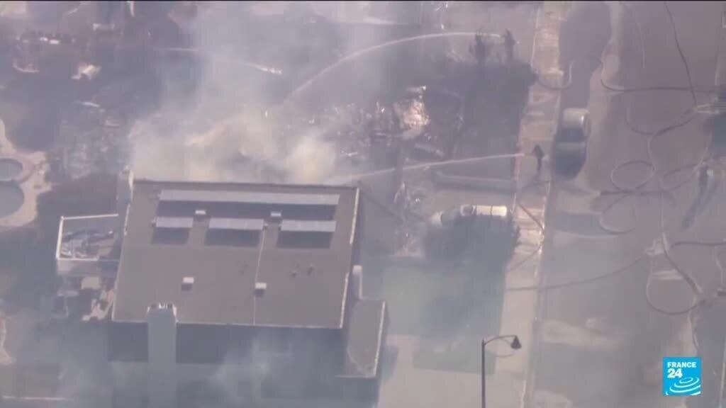 Video thumbnail for Coastal homes burn as hot winds fuel California fires