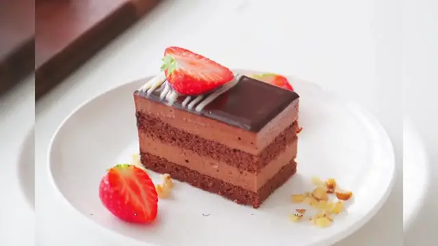 'Video thumbnail for Decadent Chocolate Mousse Cake_ A Heavenly Dessert'