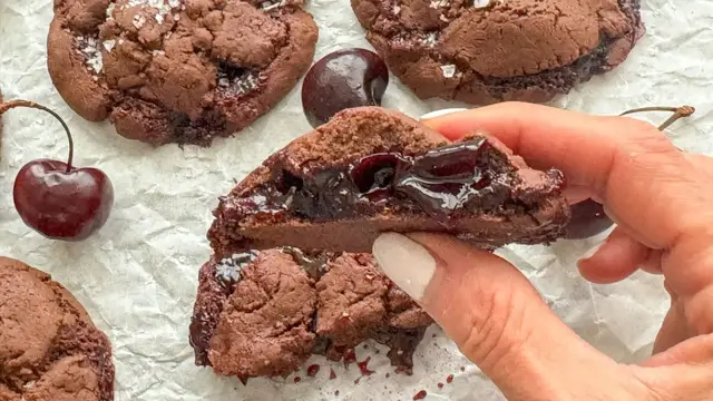'Video thumbnail for These Chocolate Cherry-Stuffed Cookies Bring A Sweet Flavor Combo To Life'