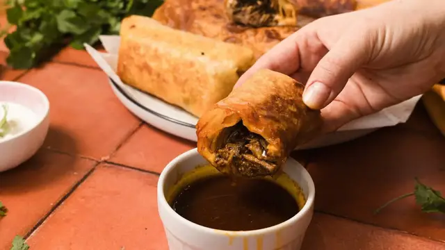 'Video thumbnail for Birria-Style Shredded Beef Chimichangas Recipe'