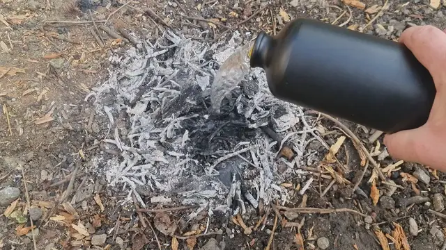 Video thumbnail for Putting Out a Camp Fire With Water