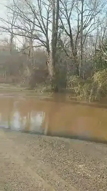 'Video thumbnail for School bus overwhelmed by flood waters in East Perry'