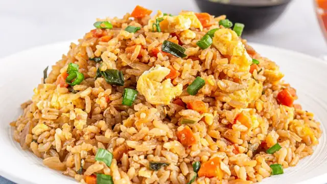 'Video thumbnail for We Finally Know What Makes Takeout Fried Rice So Delicious'