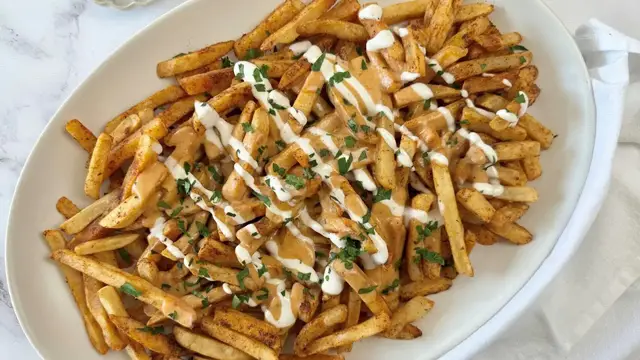 'Video thumbnail for How To Turn Frozen Fries Into Wingstop-Style Voodoo Fries At Home'