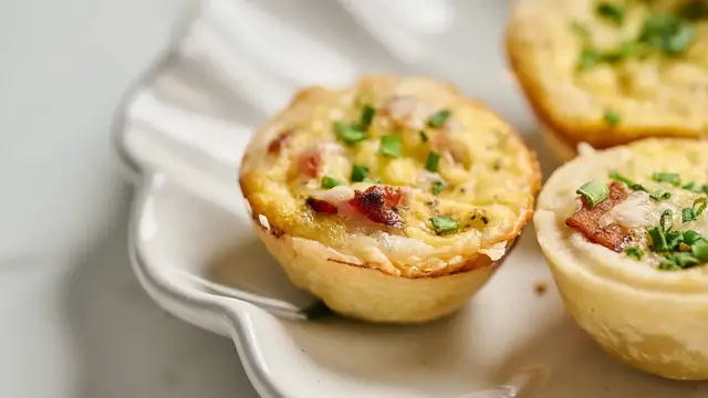 Video thumbnail for Mini Bacon And Gruyère Quiche Cups Recipe