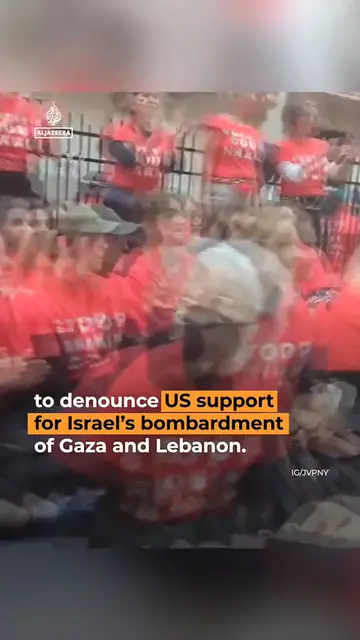 Video thumbnail for Hundreds of protesters blockaded the New York Stock Exchange to demand the US stops arming and funding Israel’s wars in Gaza and Lebanon, and to condemn weapons firms profiting from the violence.