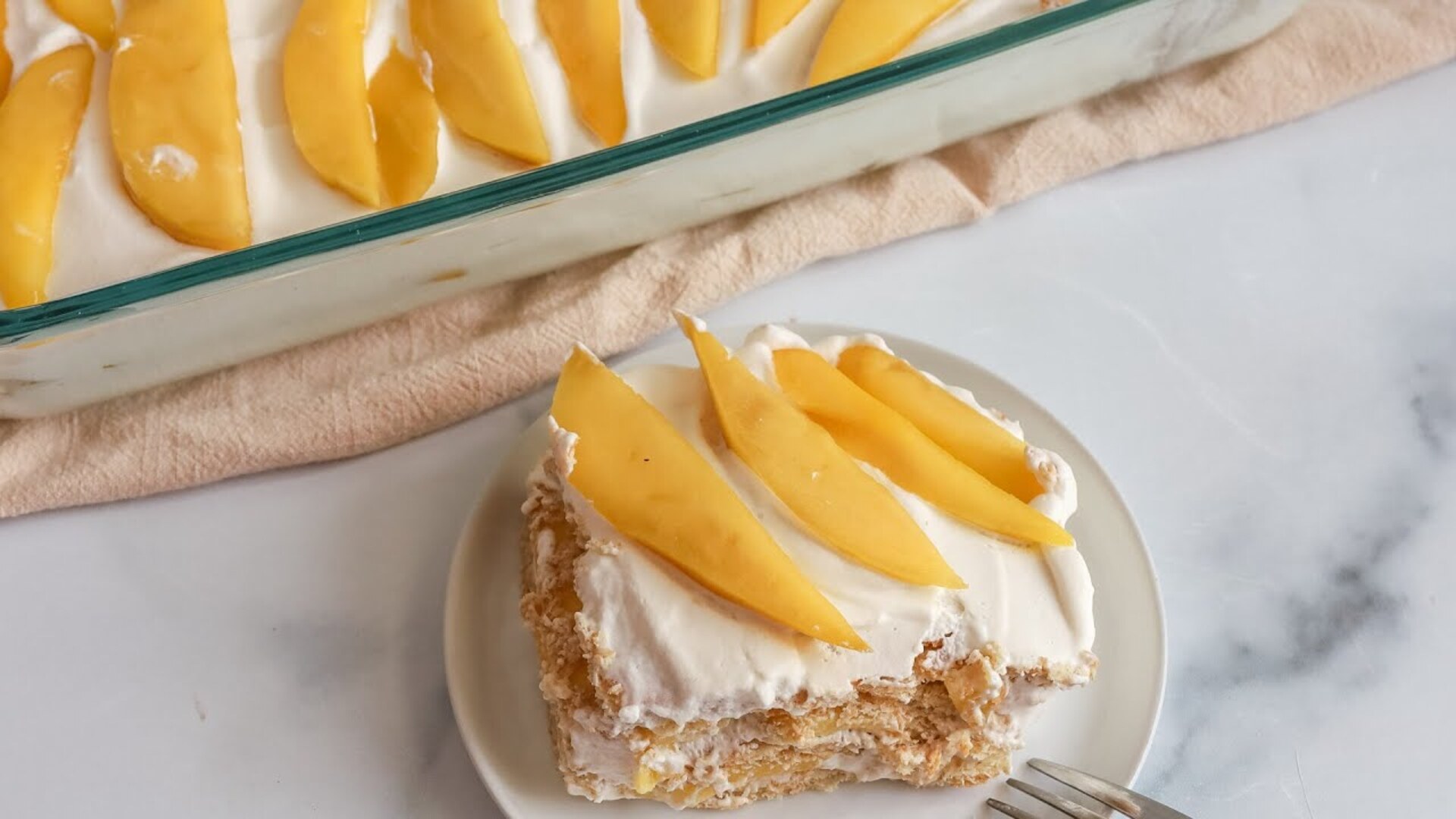Video thumbnail for This No-Bake Filipino Mango Float Puts Other Desserts To Shame