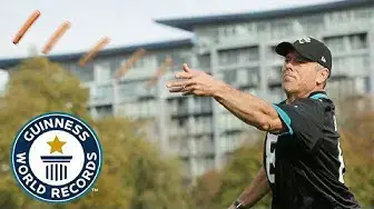 Video thumbnail for Check out the longest throw and catch of a hotdog in a bun!