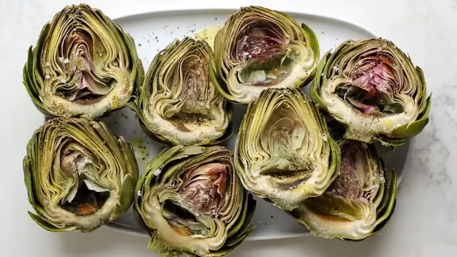 'Video thumbnail for Grilled Artichokes And Garlic-Parmesan Aioli Recipe'