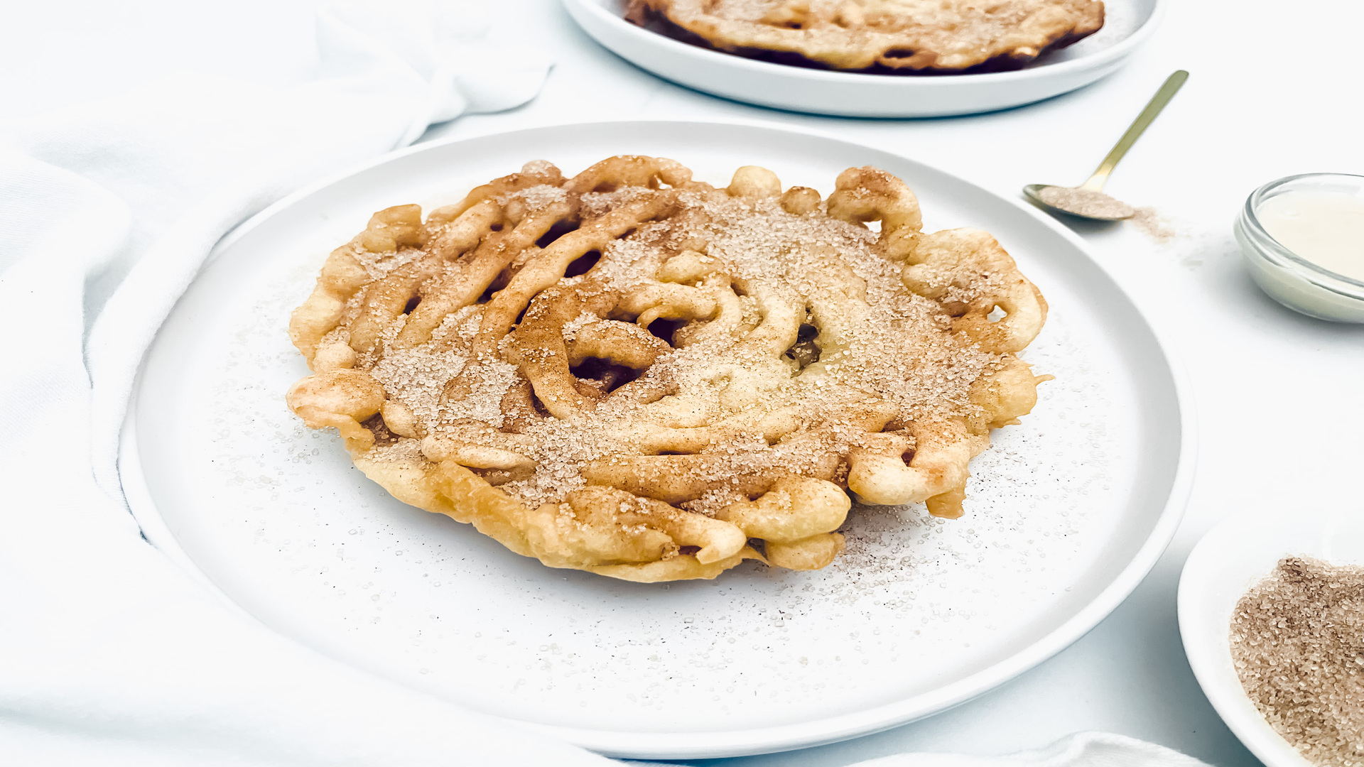 Video thumbnail for Cinnamon Sugar Funnel Cake Recipe