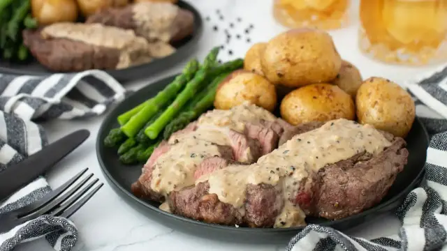 'Video thumbnail for This Steak With Whiskey Cream Sauce Takes Filet To A Whole New Level'