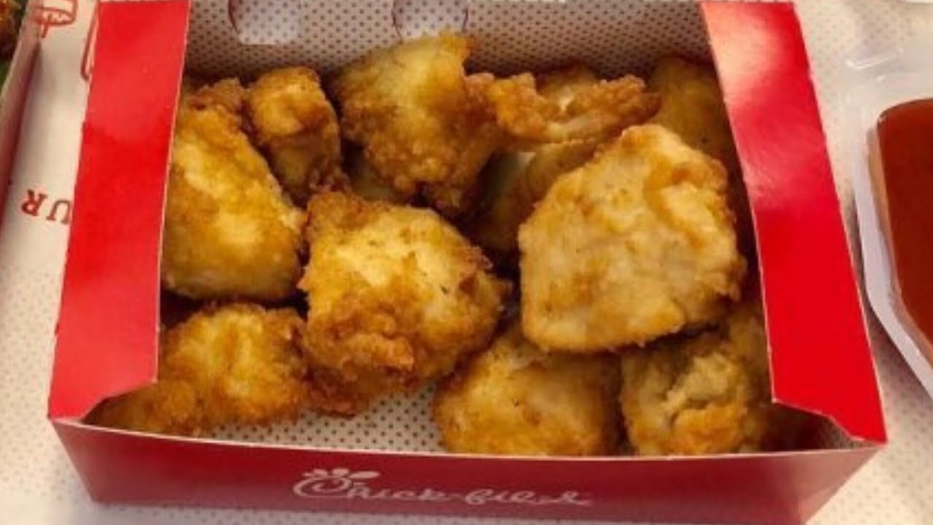 Video thumbnail for Why There's A Hole In The Chick-Fil-A Nugget Box