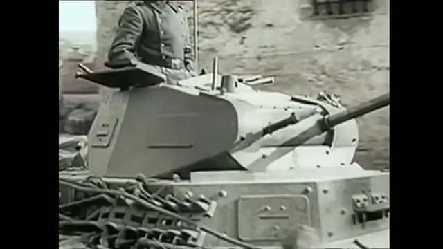 Video thumbnail for Panzers roll through a French town 1940.
