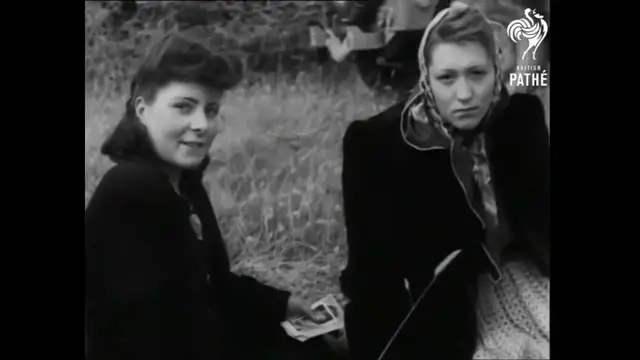 Video thumbnail for Female soldiers surrendering at Cherbourg 1944.