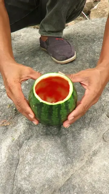 Video thumbnail for MAN makes FIRE in Watermelon 🔥 #survival #lifehack #camping #outdoors