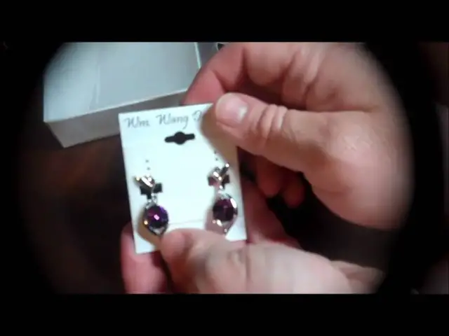Video thumbnail for Dangle Earrings with Swarovski Crystal Set in Platinum from William Wang Designs.