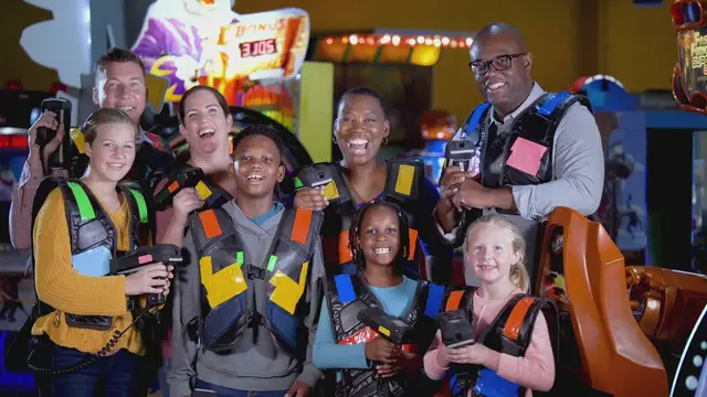 'Video thumbnail for A family playing laser tag'