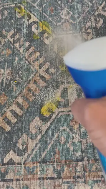 'Video thumbnail for Cleaning an area rug on laminate floor'