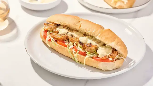 'Video thumbnail for This Grilled Shrimp Po-Boy Sandwich Recipe Will Transport You To New Orleans'