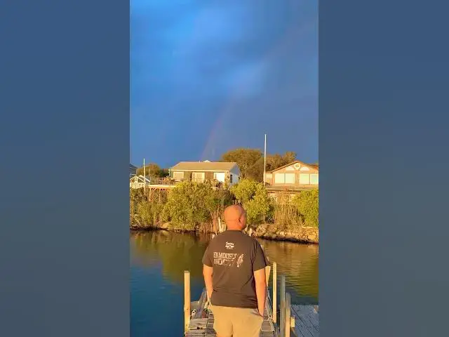 'Video thumbnail for Taking pictures of sunset in Rhode Island and we spotted a rainbow! #rainbow'