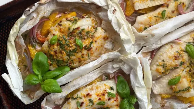 'Video thumbnail for Orange And Basil Tilapia Baked In Parchment Recipe'