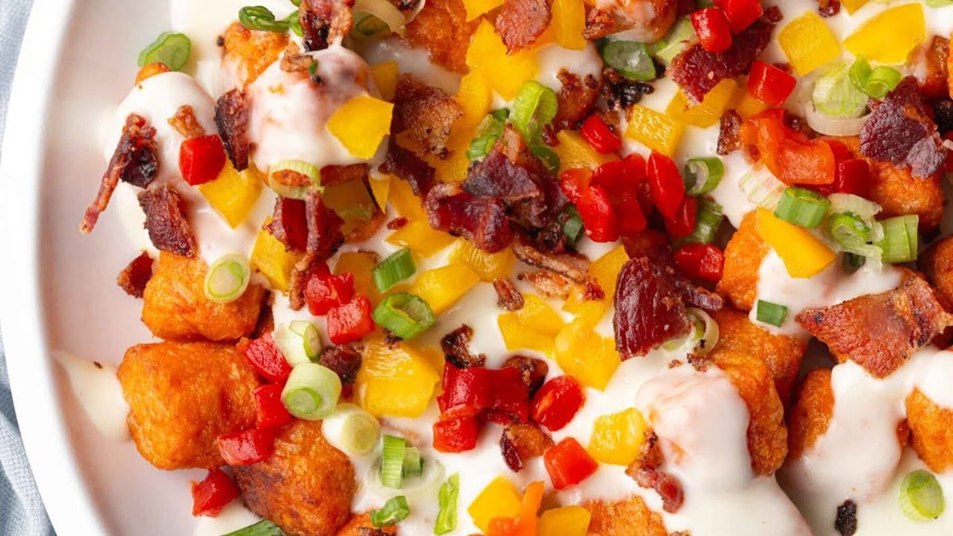 Video thumbnail for Loaded Cheesy Sweet Potato Tots Recipe