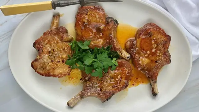 'Video thumbnail for Sweet And Spicy Apricot-Glazed Pork Chops Recipe'