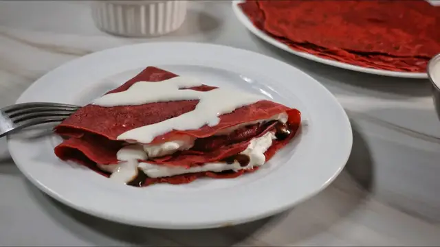 Video thumbnail for Red Velvet Crepes With Cream Cheese Drizzle Recipe