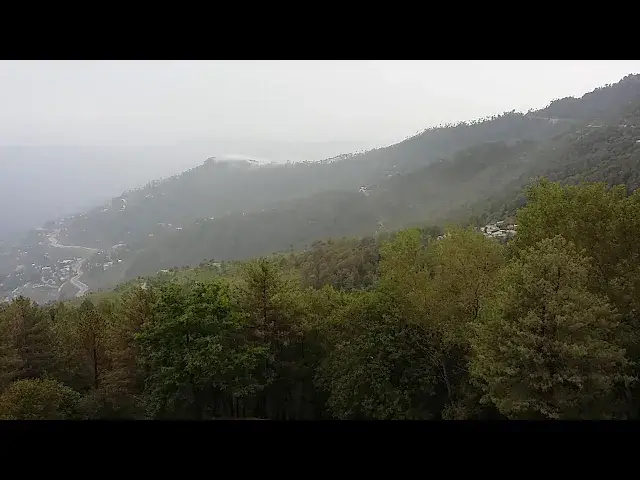 'Video thumbnail for View of Rain in Murree from Hotel Balcony'