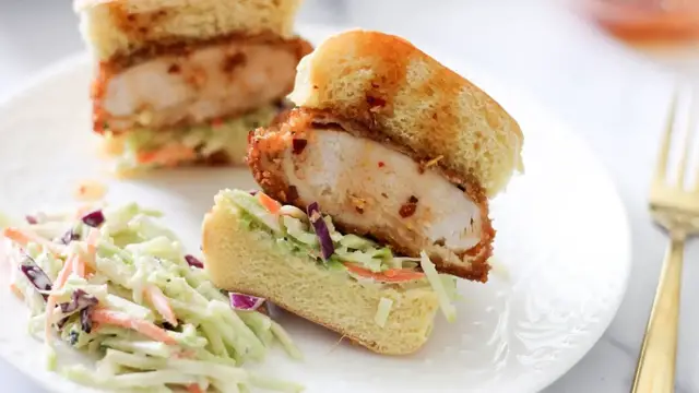 'Video thumbnail for Fried Chicken Sliders With Simple Slaw And Hot Honey Recipe'