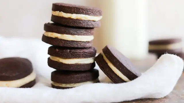 'Video thumbnail for Chocolate Peanut Butter And Hazelnut Sandwich Cookies Recipe'