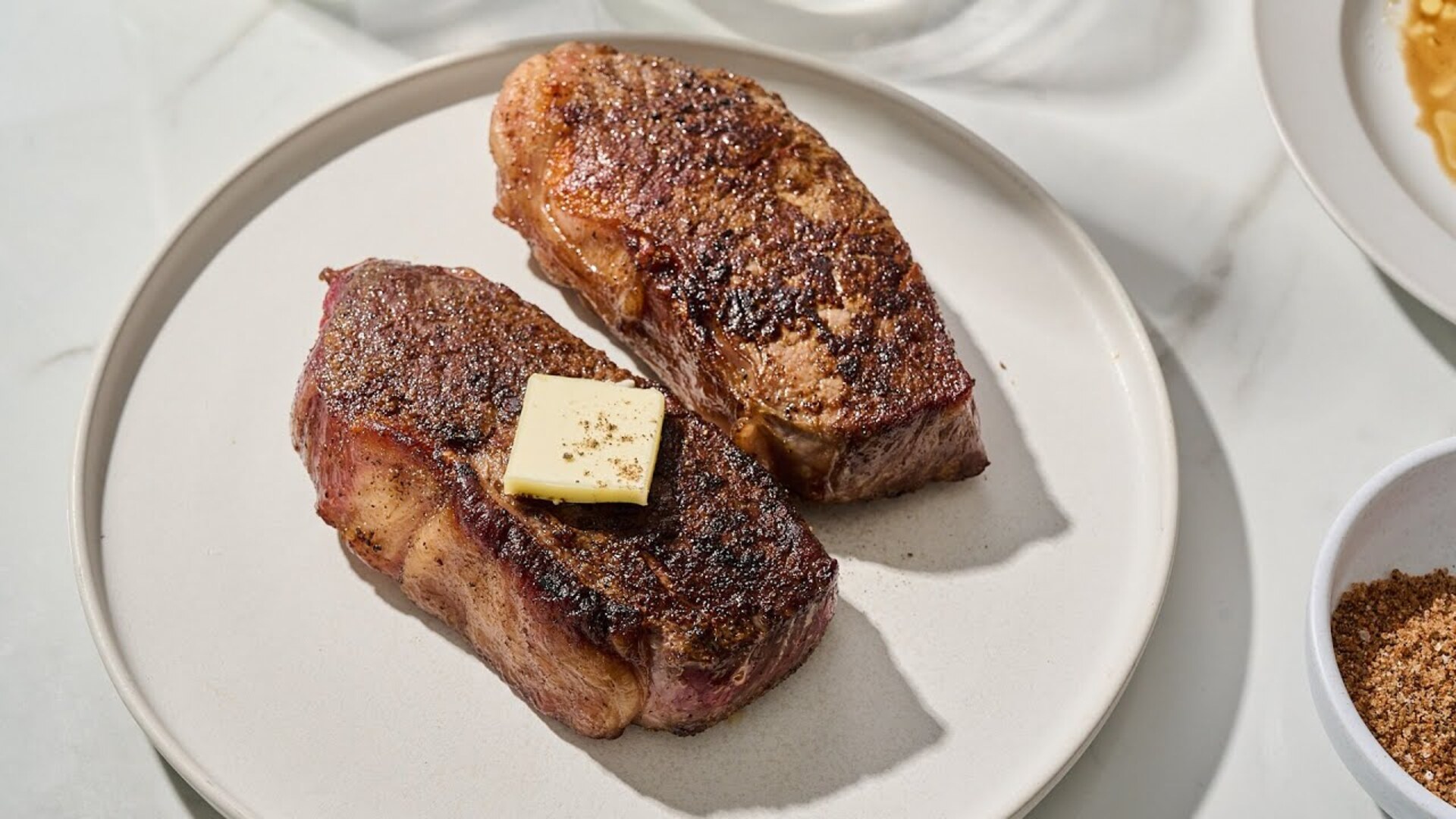 Video thumbnail for This Spicy Bourbon-Rubbed Strip Steak Is Layered With Flavor