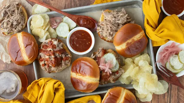 Video thumbnail for Slow Cooker Texas Pulled Pork Sandwich Recipe