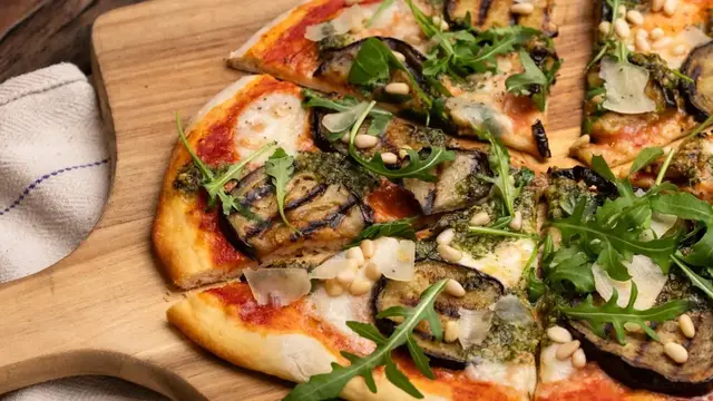 'Video thumbnail for Cheesy Eggplant Parmesan Pizza Recipe'